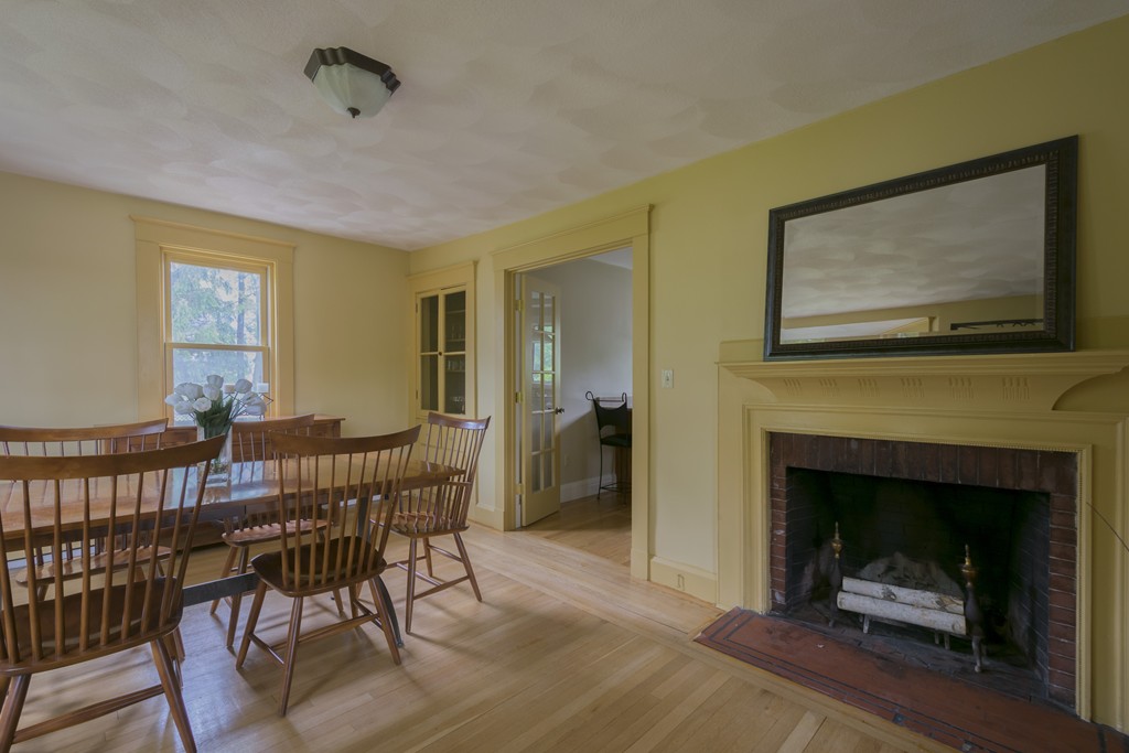 4 Reed Street Lexington, MA 02421 - Photo 7 of 30 a view of a livingroom with furniture and a fireplace