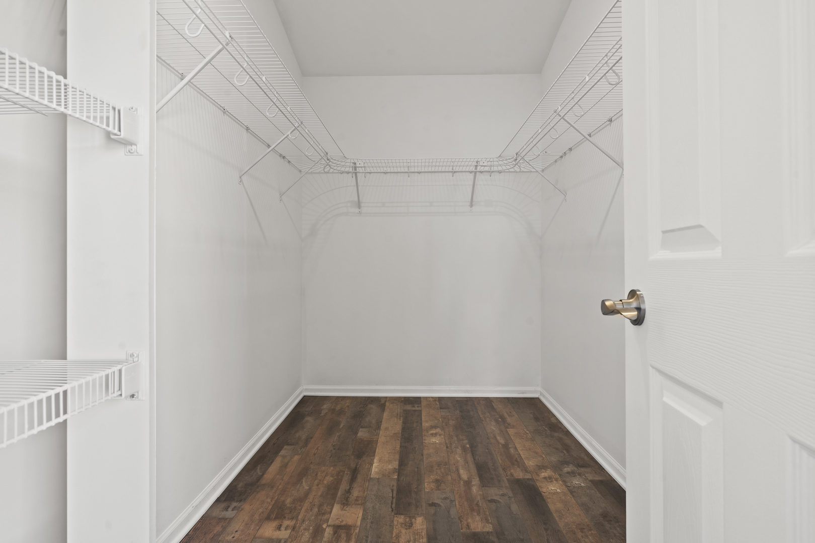 32804 Bending Creek Road Lakemoor, IL 60051 - Photo 24 of 42 a view of a room with racks on the wall