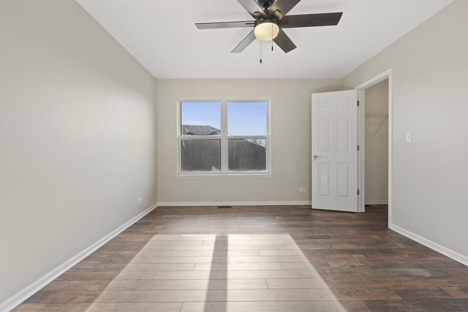 32804 Bending Creek Road Lakemoor, IL 60051 - Photo 26 of 42 a view of an empty room with a window