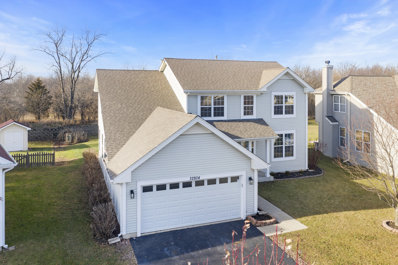32804 Bending Creek Road Lakemoor, IL 60051 - Photo 41 of 42 a view of house with garden