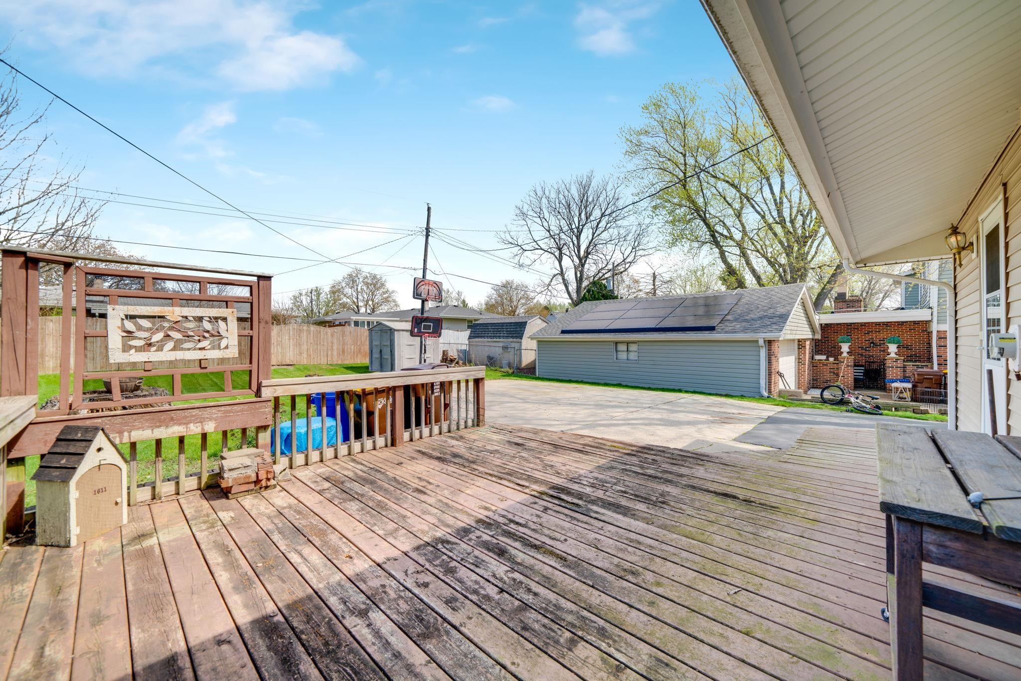 1611 Notre Dame Road Rockford, IL 61103 - Photo 27 of 33 a view of a terrace with wooden floor and outdoor space