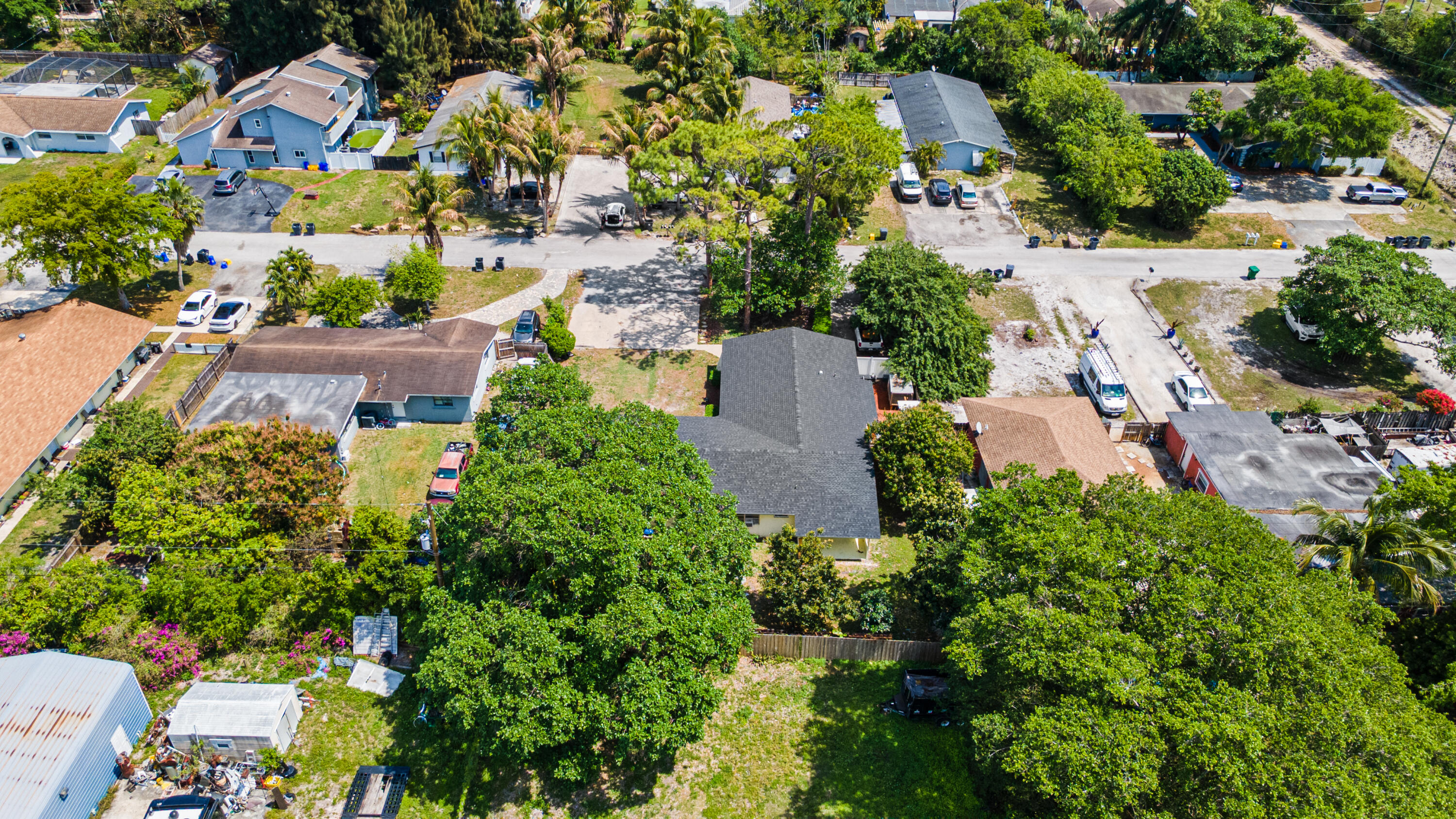 4453 Stevens Road Lake Worth Beach, FL 33461 - Photo 7 of 67 an aerial view of a houses with a yard