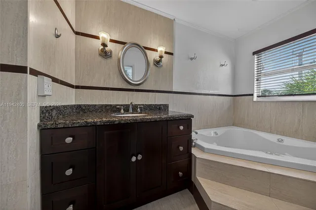 a view of a storage & utility room with two washing machine