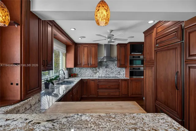 a bedroom with a large bed and a tv