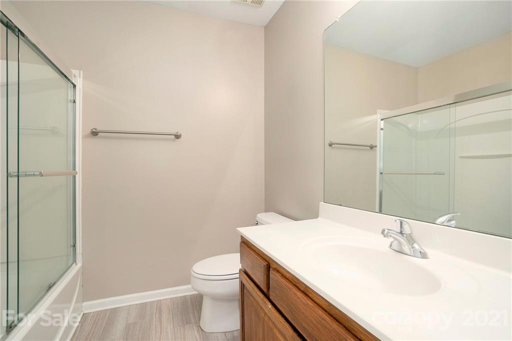 10621 Fuller Ridge Circle Charlotte, NC 28270 - Photo 17 of 32 a bathroom with a sink and a toilet