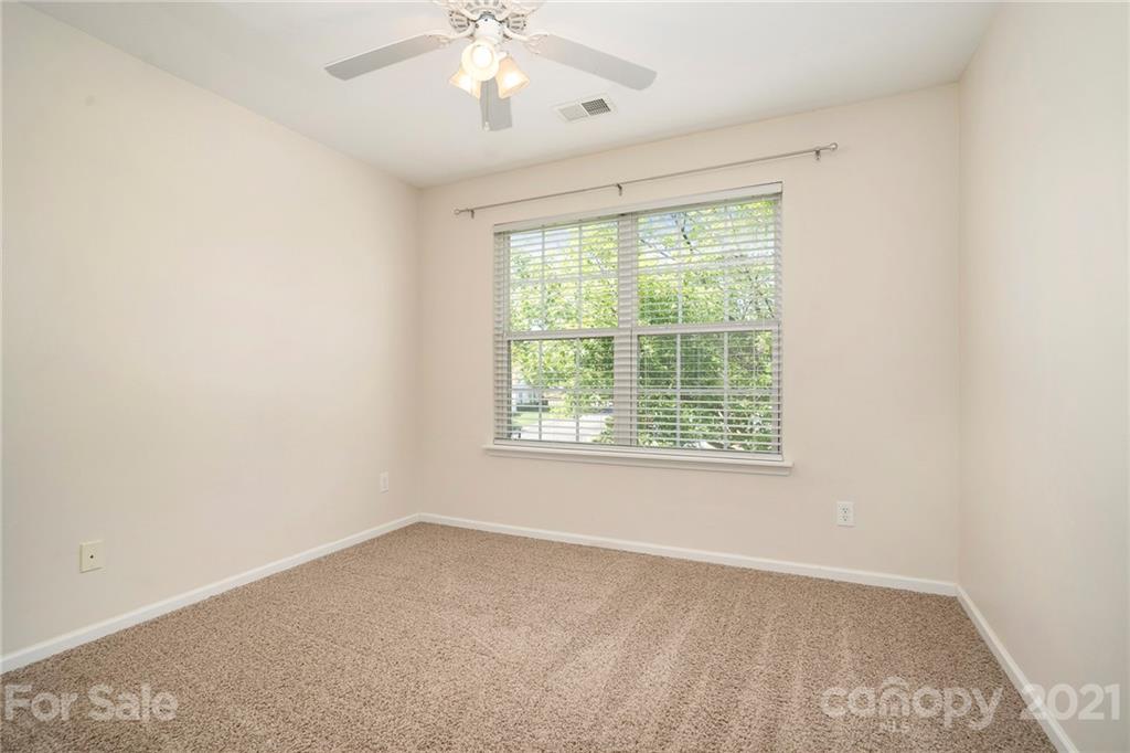 10621 Fuller Ridge Circle Charlotte, NC 28270 - Photo 19 of 32 a view of an empty room with a window