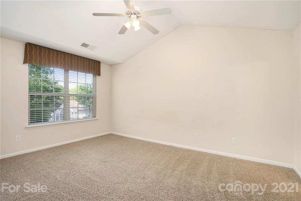 10621 Fuller Ridge Circle Charlotte, NC 28270 - Photo 21 of 32 a view of an empty room with a window