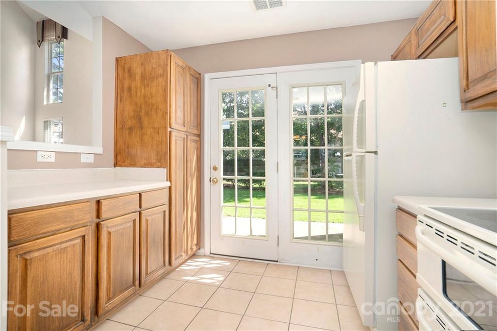 10621 Fuller Ridge Circle Charlotte, NC 28270 - Photo 4 of 32 a view of a kitchen with an empty space and a window
