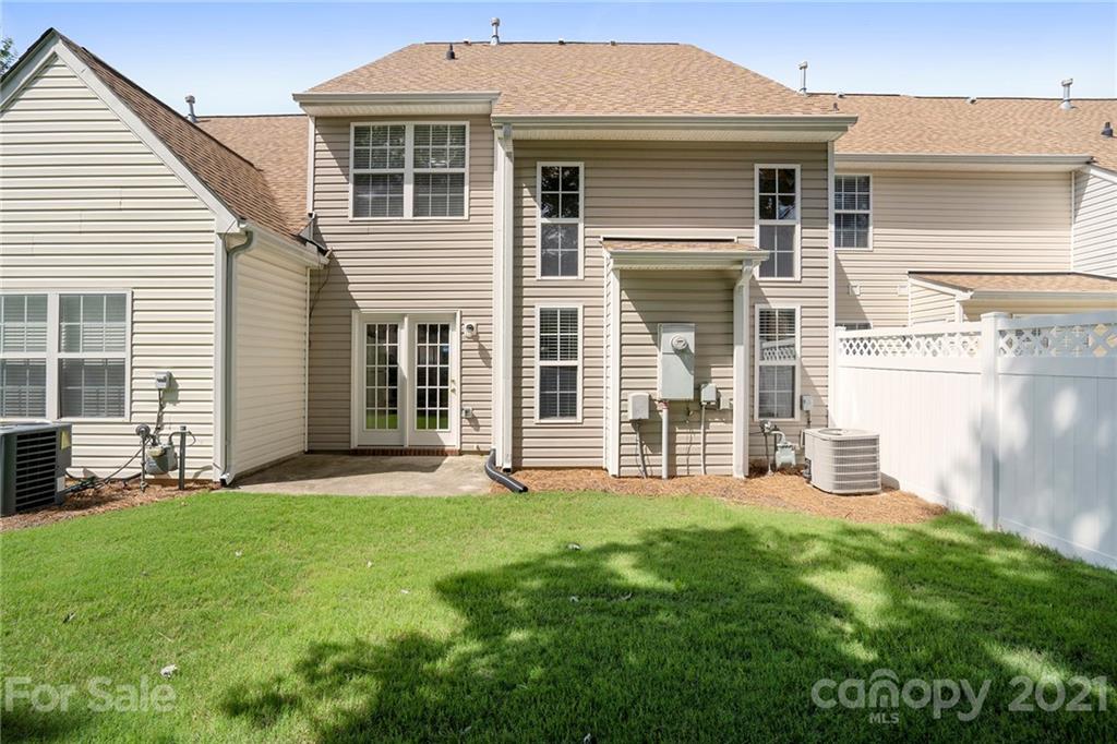 10621 Fuller Ridge Circle Charlotte, NC 28270 - Photo 32 of 32 a front view of a house with a yard