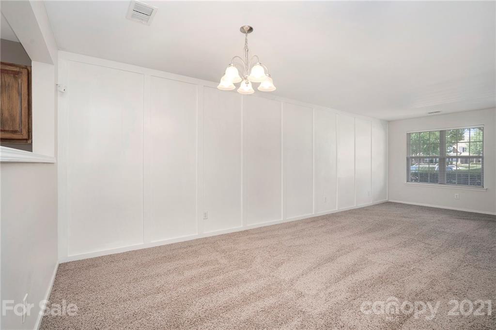 10621 Fuller Ridge Circle Charlotte, NC 28270 - Photo 5 of 32 a view of an empty room with a window