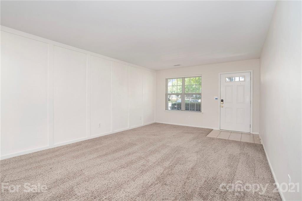 10621 Fuller Ridge Circle Charlotte, NC 28270 - Photo 8 of 32 an empty room with windows