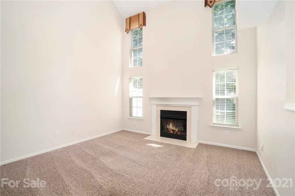 10621 Fuller Ridge Circle Charlotte, NC 28270 - Photo 10 of 32 a view of an empty room with a window