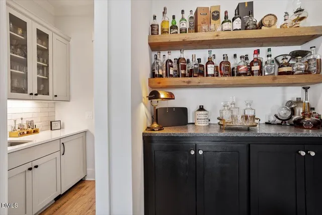 a kitchen with appliances and cabinets