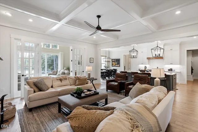 a living room with furniture or couches and a large window