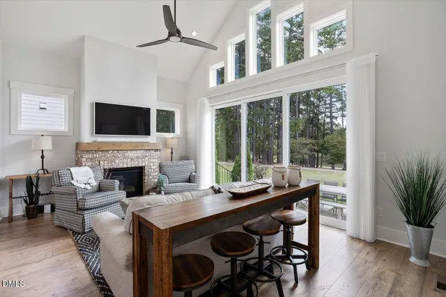 a view of a livingroom with furniture and a fireplace