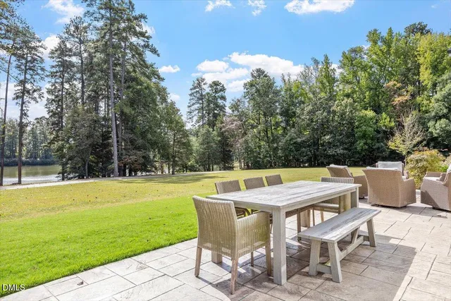 a view of a patio with a yard