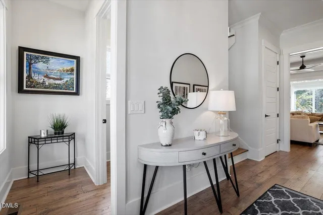 a view of a livingroom with furniture and wooden floor