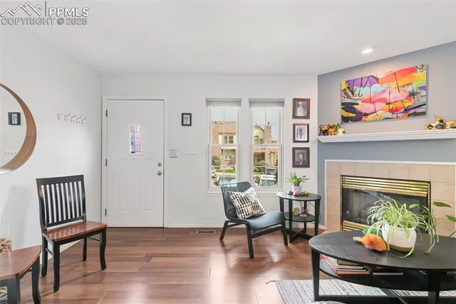 a view of a livingroom with furniture and a fireplace