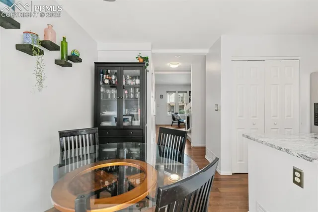 a view of a balcony and wooden floor