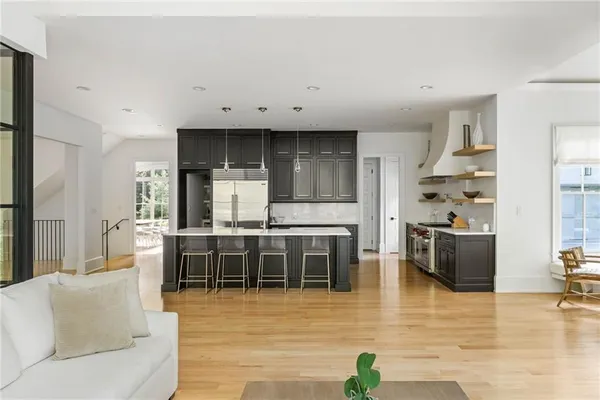 a spacious bedroom with a bed and window