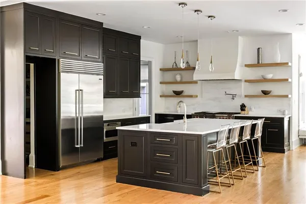 a white bath tub sitting in a bathroom