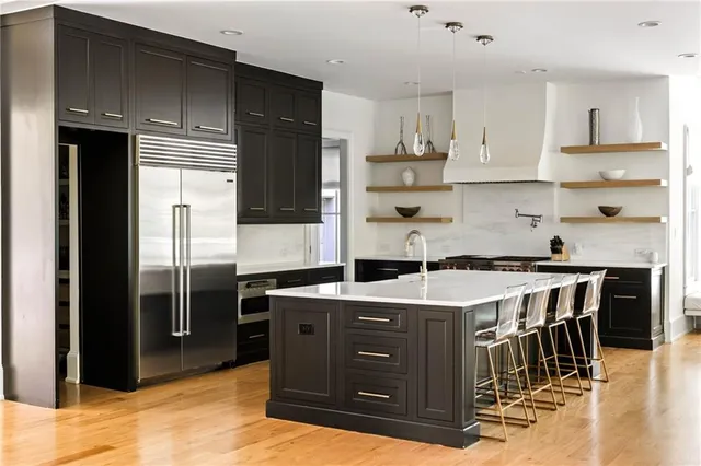 a white bath tub sitting in a bathroom