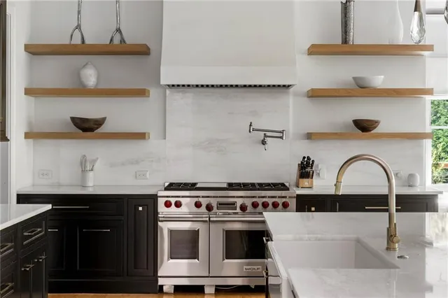 a spacious bathroom with a granite countertop sink mirror and a