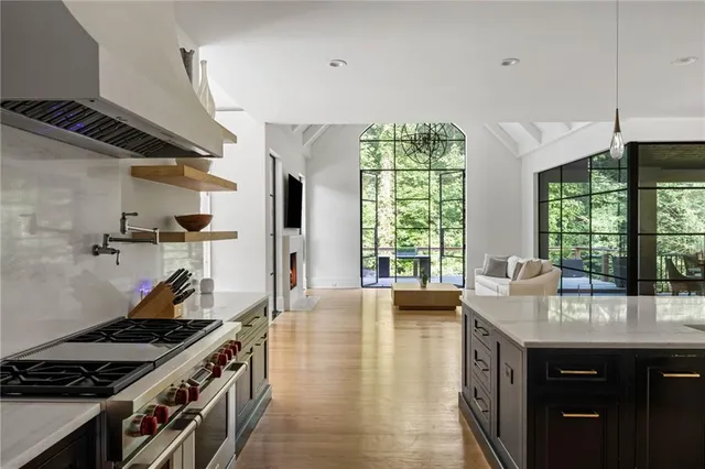 a spacious bedroom with a bed and a window