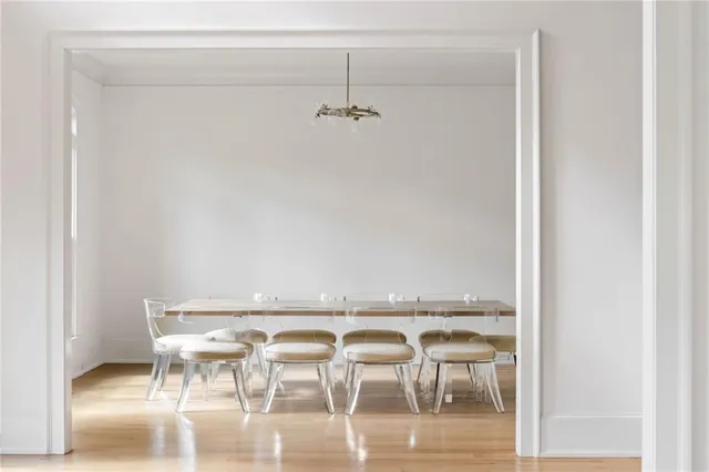 a spacious bedroom with a bed and a window