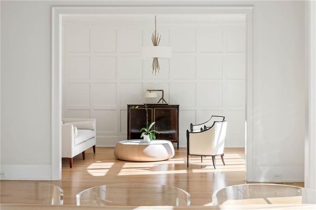 an aerial view of a house with garden space and street view