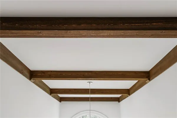 a view of house with outdoor space and garden