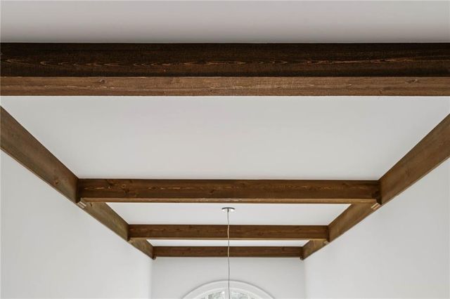 a view of house with outdoor space and garden