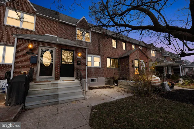 a view of a building with sitting area