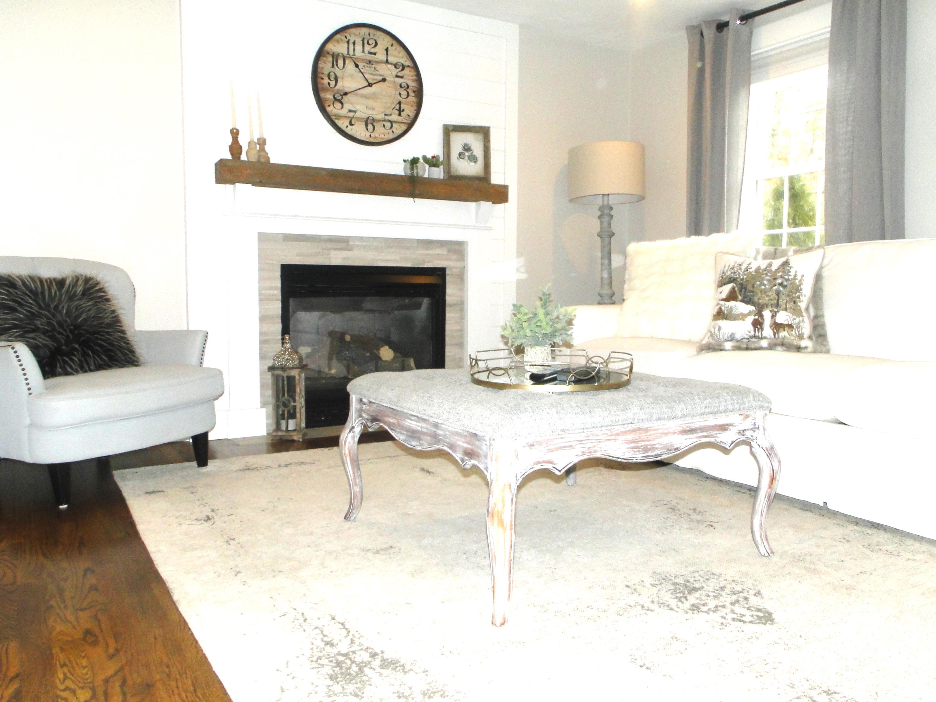 30 Brewster Road Mashpee, MA 02649 - Photo 17 of 58 a living room with furniture a fireplace and a table