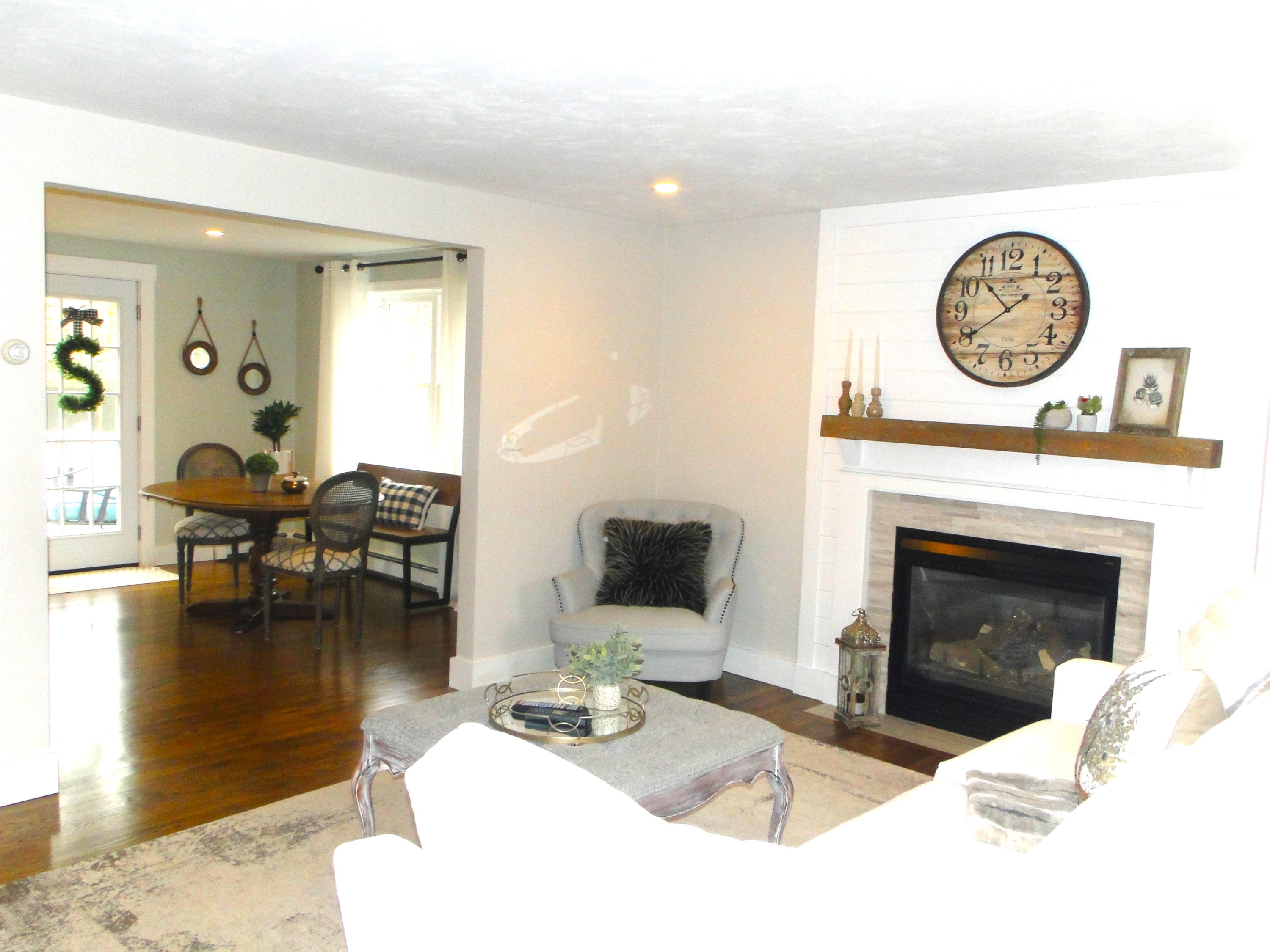 30 Brewster Road Mashpee, MA 02649 - Photo 21 of 58 a living room with furniture a fireplace and a flat screen tv