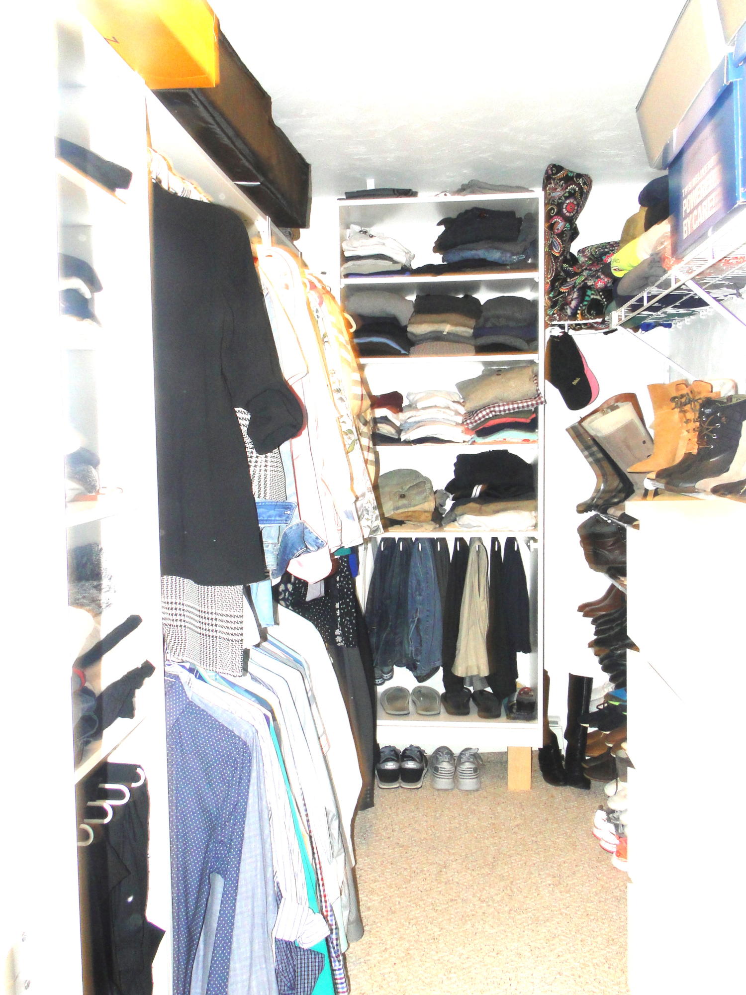 30 Brewster Road Mashpee, MA 02649 - Photo 37 of 58 a view of walk in closet with clothes and shoes