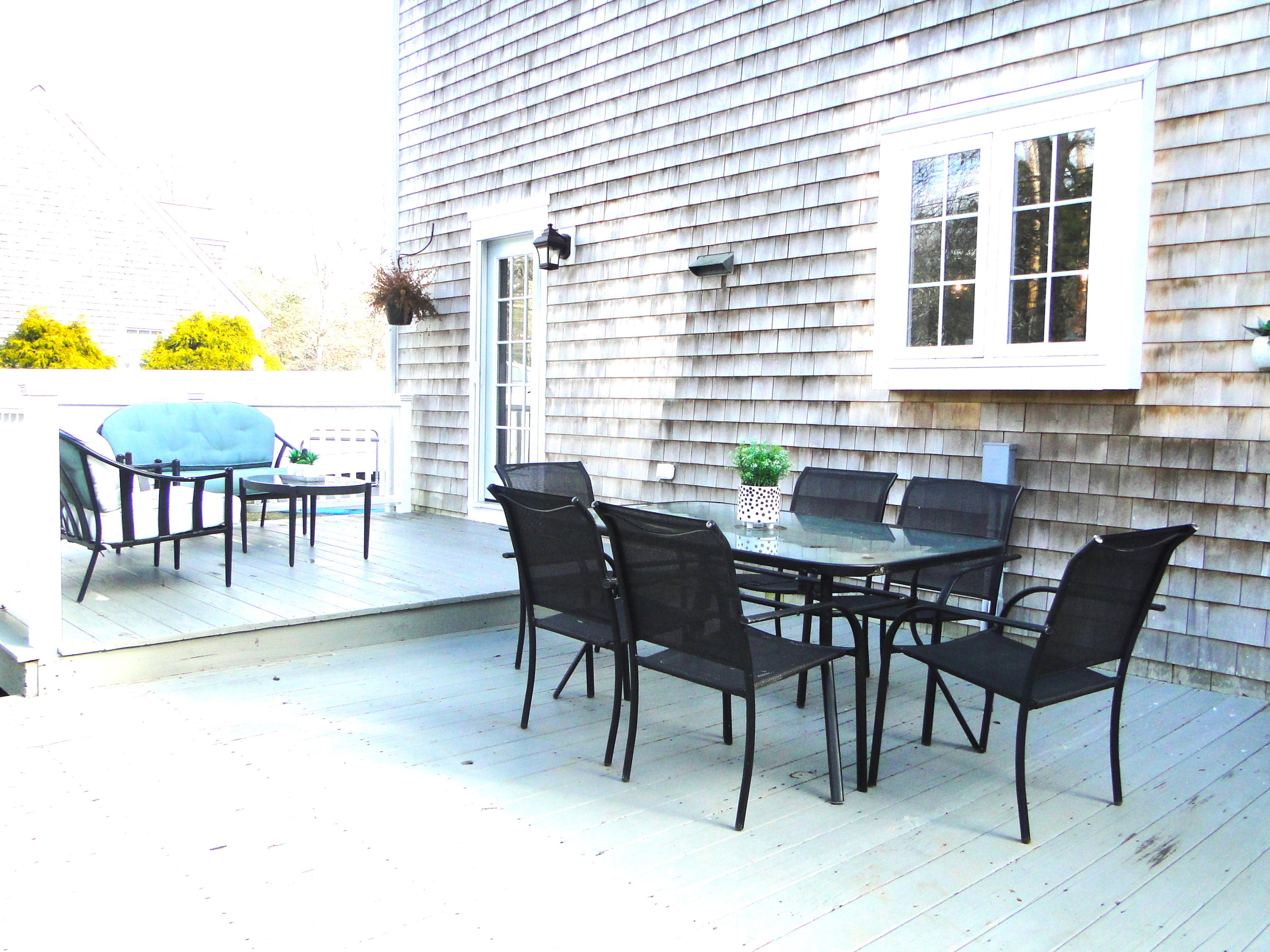 30 Brewster Road Mashpee, MA 02649 - Photo 47 of 58 a view of a dining room with furniture and wooden floor