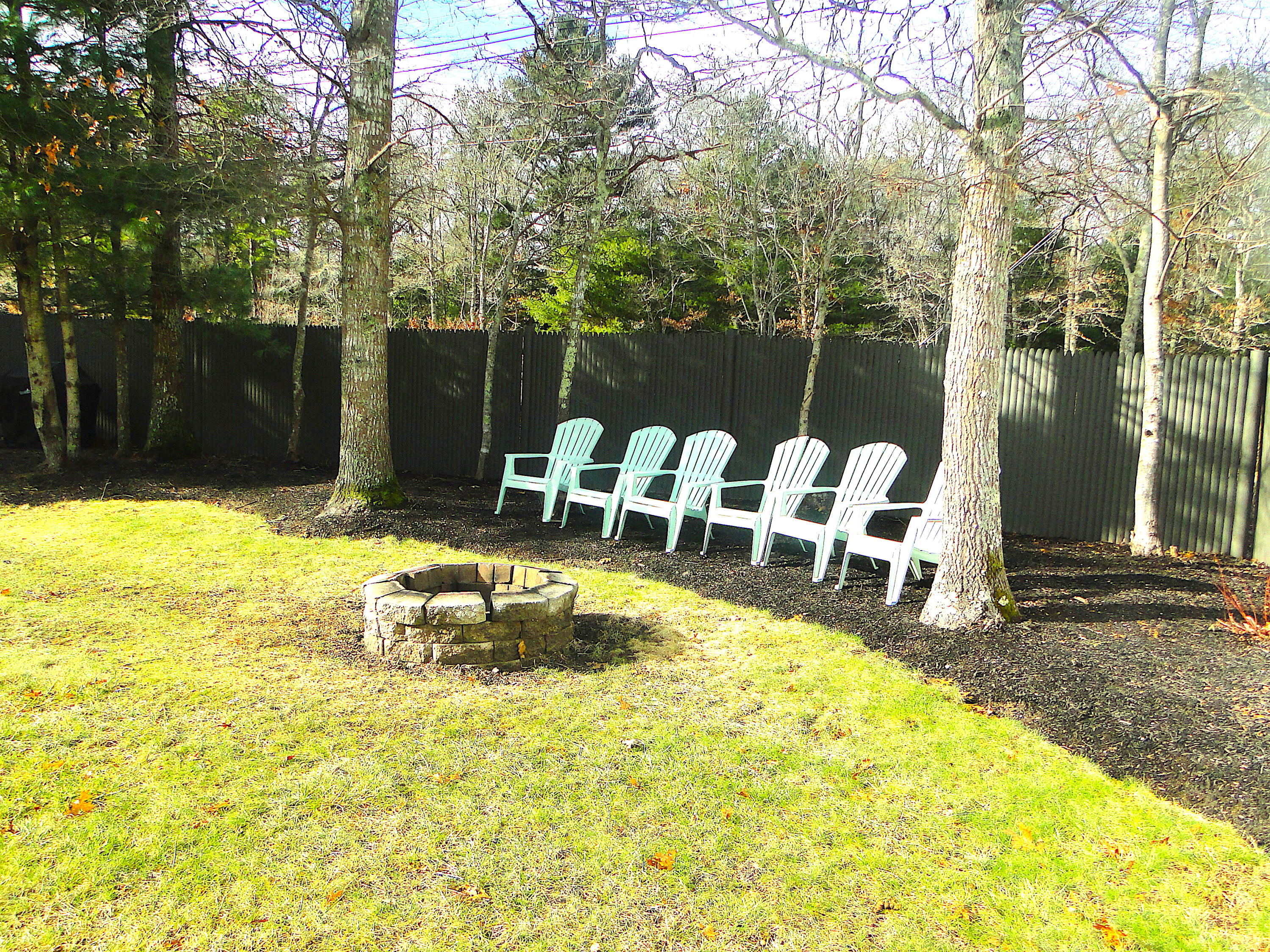 30 Brewster Road Mashpee, MA 02649 - Photo 49 of 58 a view of a swimming pool with an outdoor seating