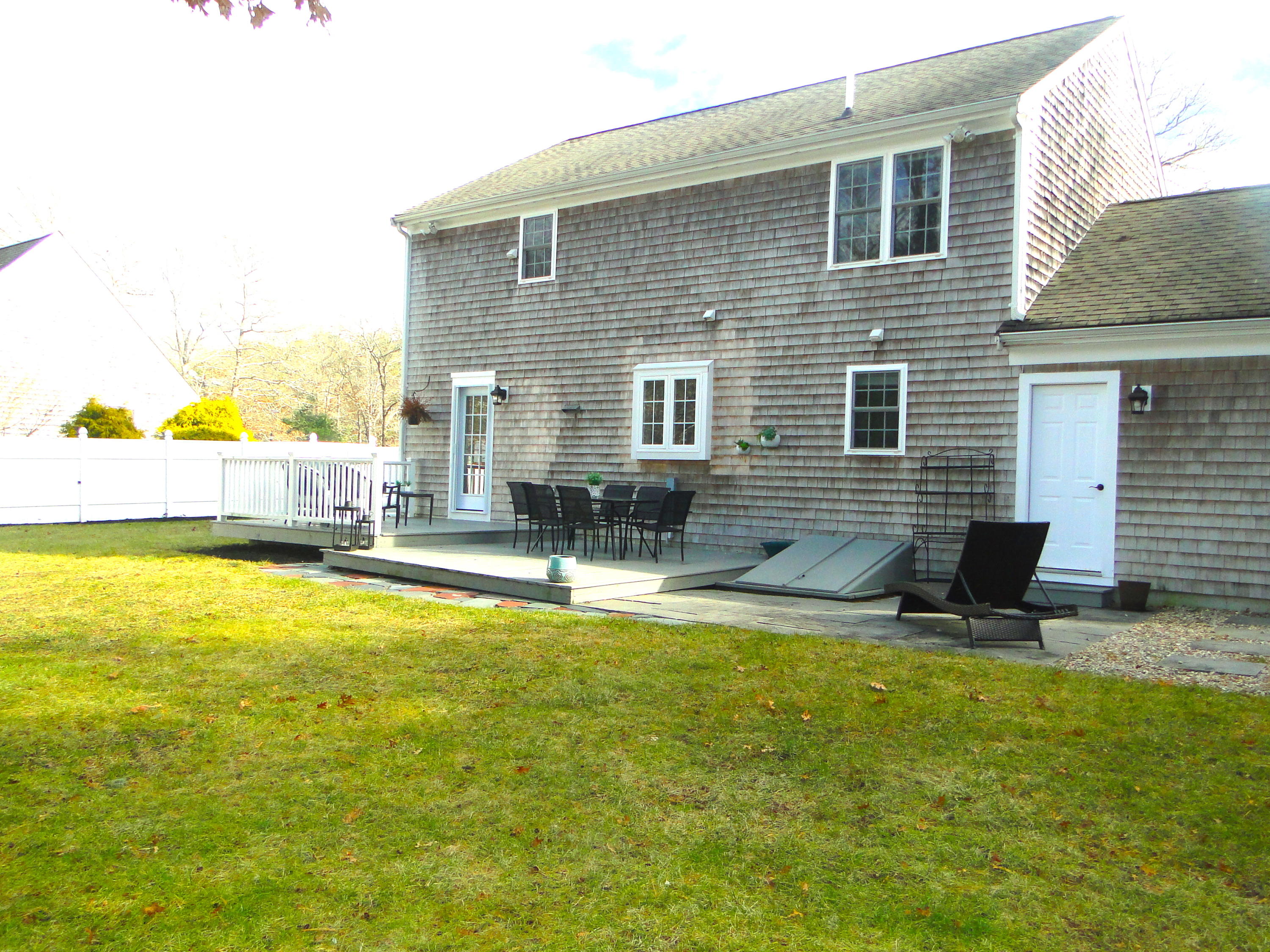 30 Brewster Road Mashpee, MA 02649 - Photo 51 of 58 a view of swimming pool with lawn chairs