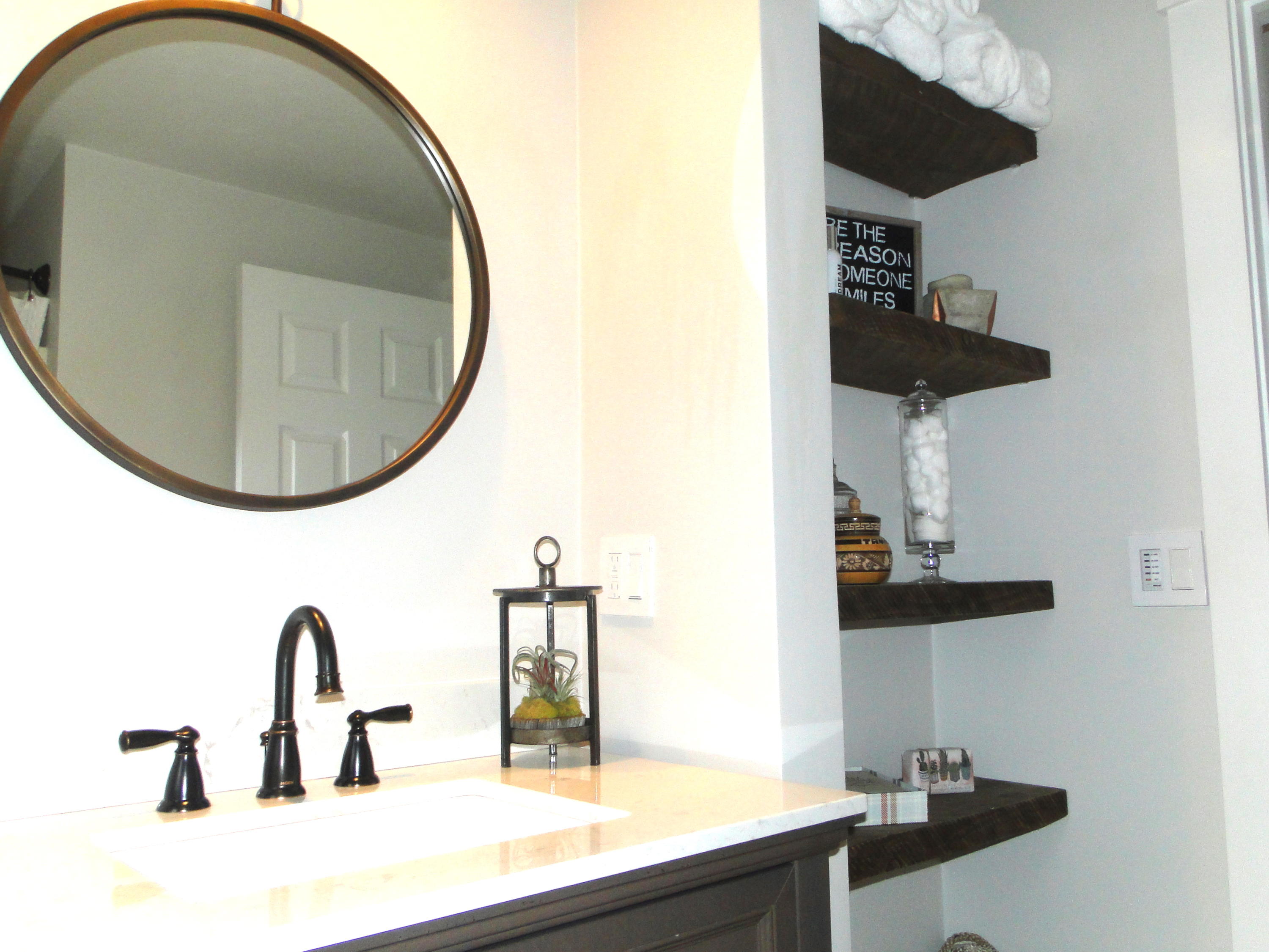 30 Brewster Road Mashpee, MA 02649 - Photo 9 of 58 a bathroom with a sink and a mirror