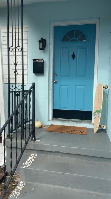 3225 32nd Avenue North St. Petersburg, FL 33713 - Photo 2 of 7 a view of a balcony with chair and door
