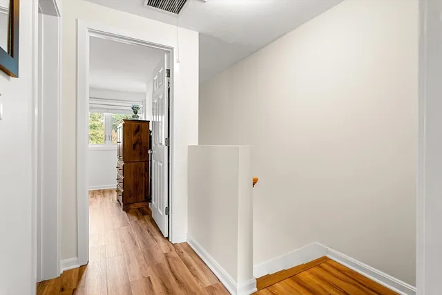 a view of a livingroom from a hallway