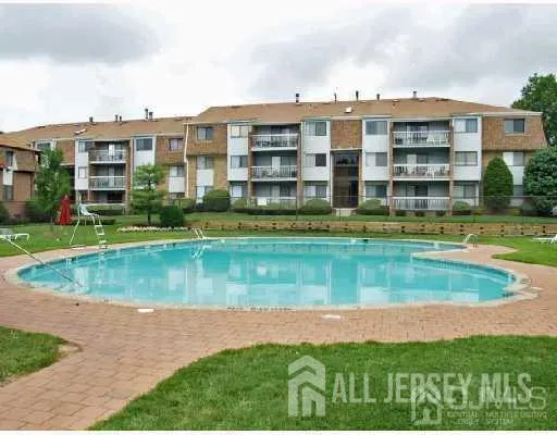 a view of a building with a swimming pool