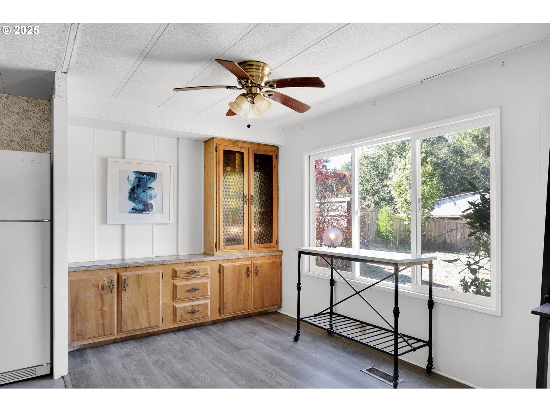 31145 Kenady Lane Cottage Grove, OR 97424 - Photo 12 of 47 a view of a livingroom with furniture ceiling fan and window