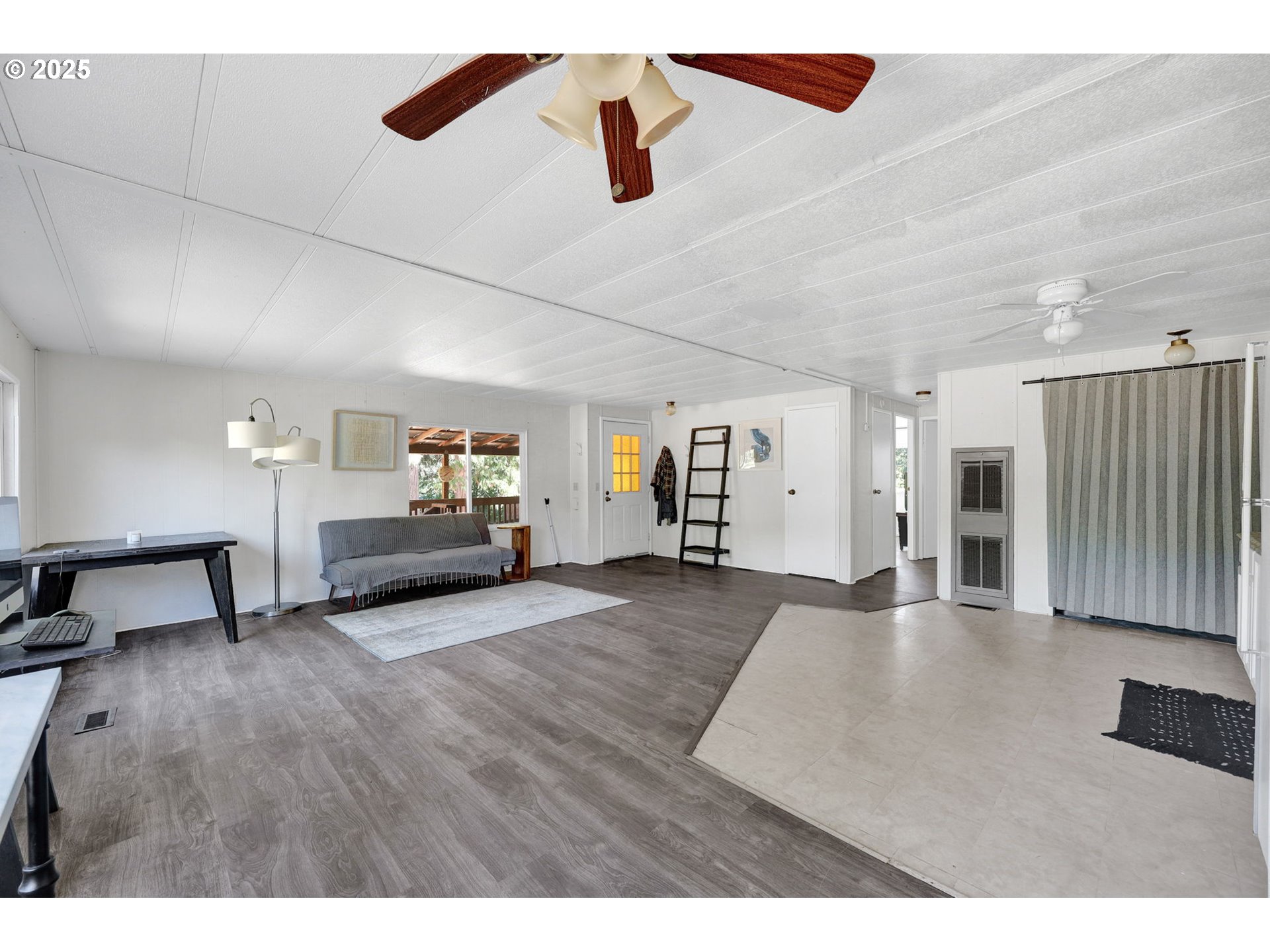 31145 Kenady Lane Cottage Grove, OR 97424 - Photo 16 of 47 a living room with furniture and a ceiling fan
