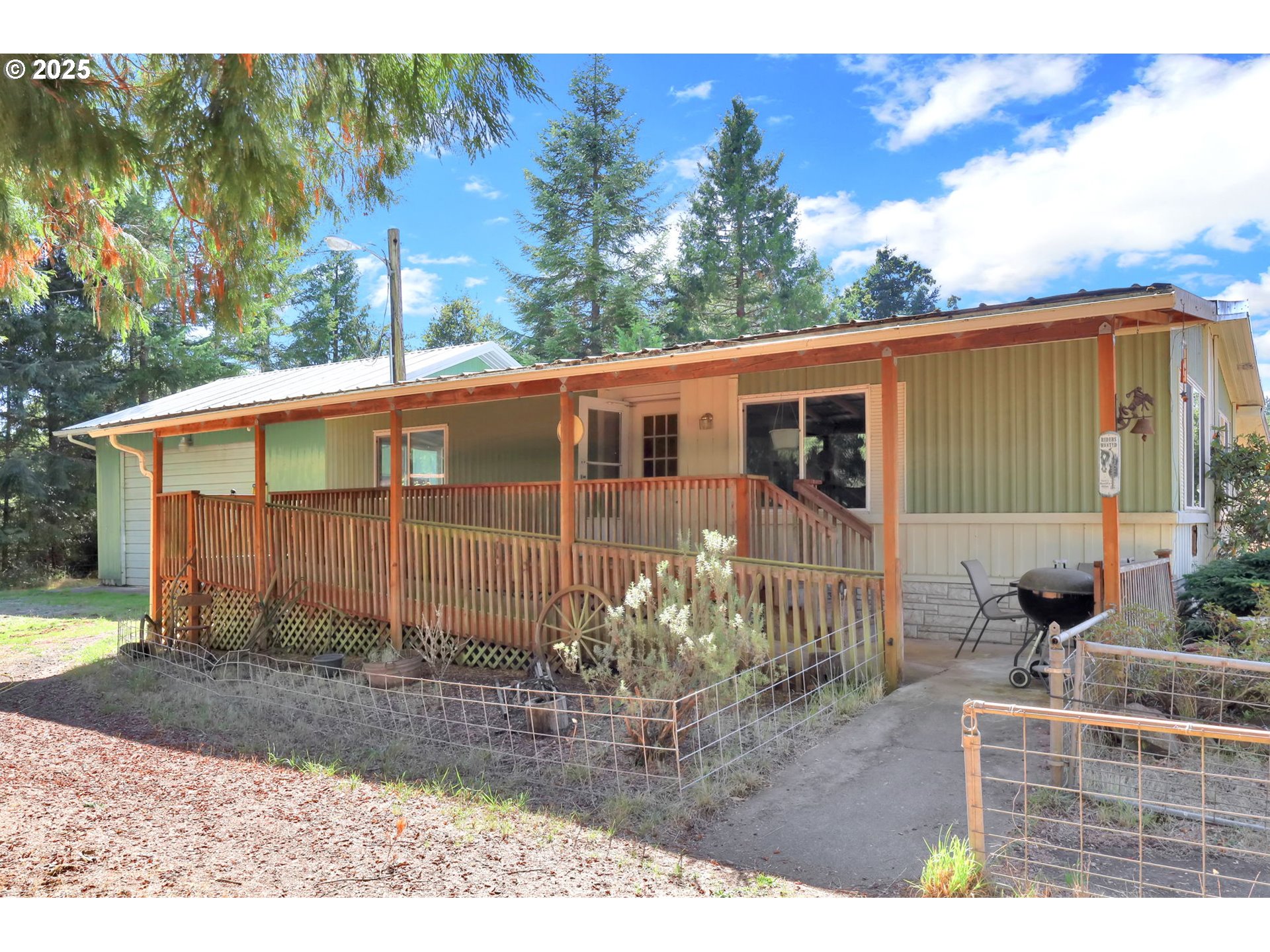 31145 Kenady Lane Cottage Grove, OR 97424 - Photo 3 of 47 a view of a house with backyard and sitting area