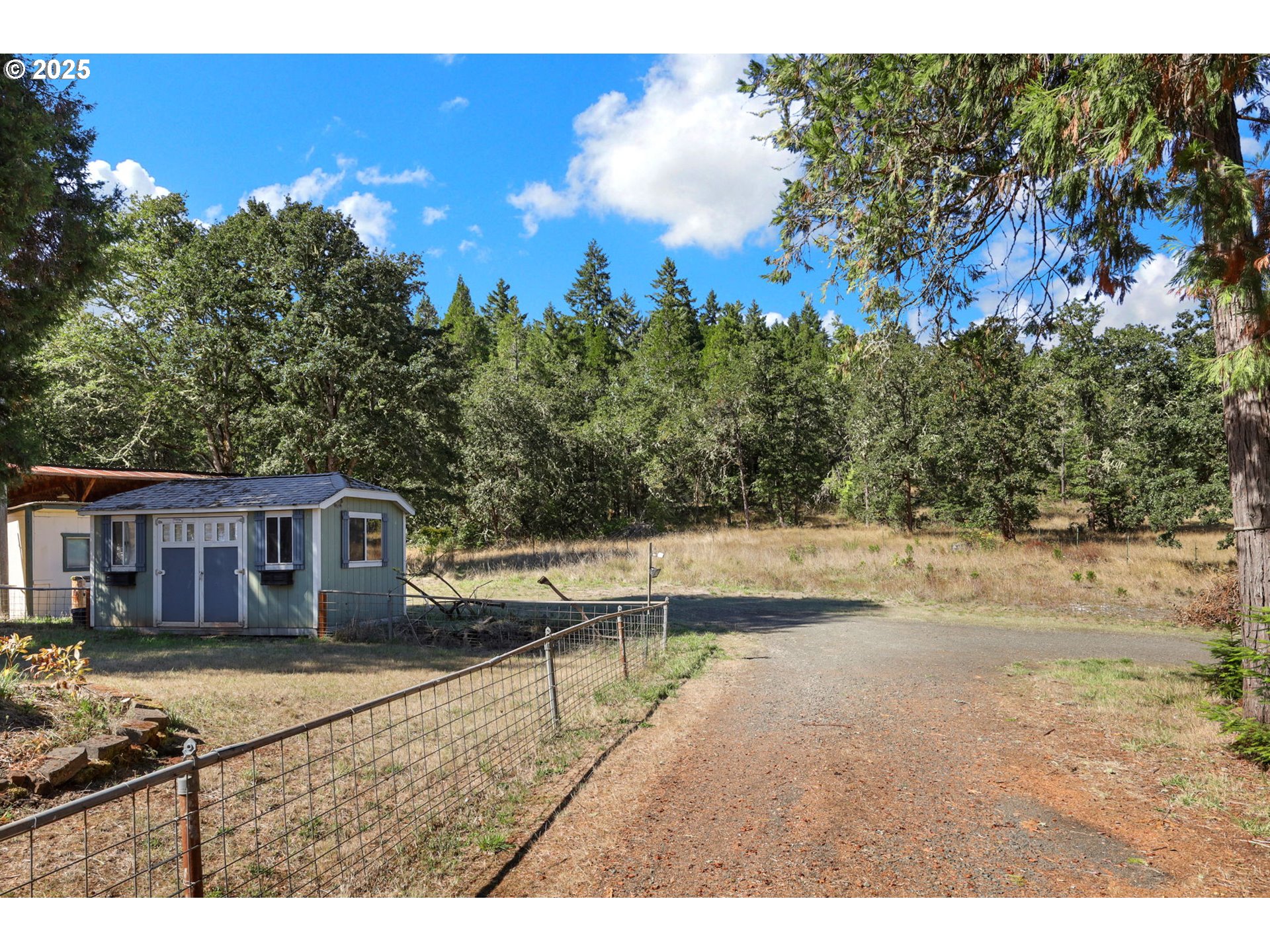 31145 Kenady Lane Cottage Grove, OR 97424 - Photo 47 of 47 a view of house with outdoor space and sitting area