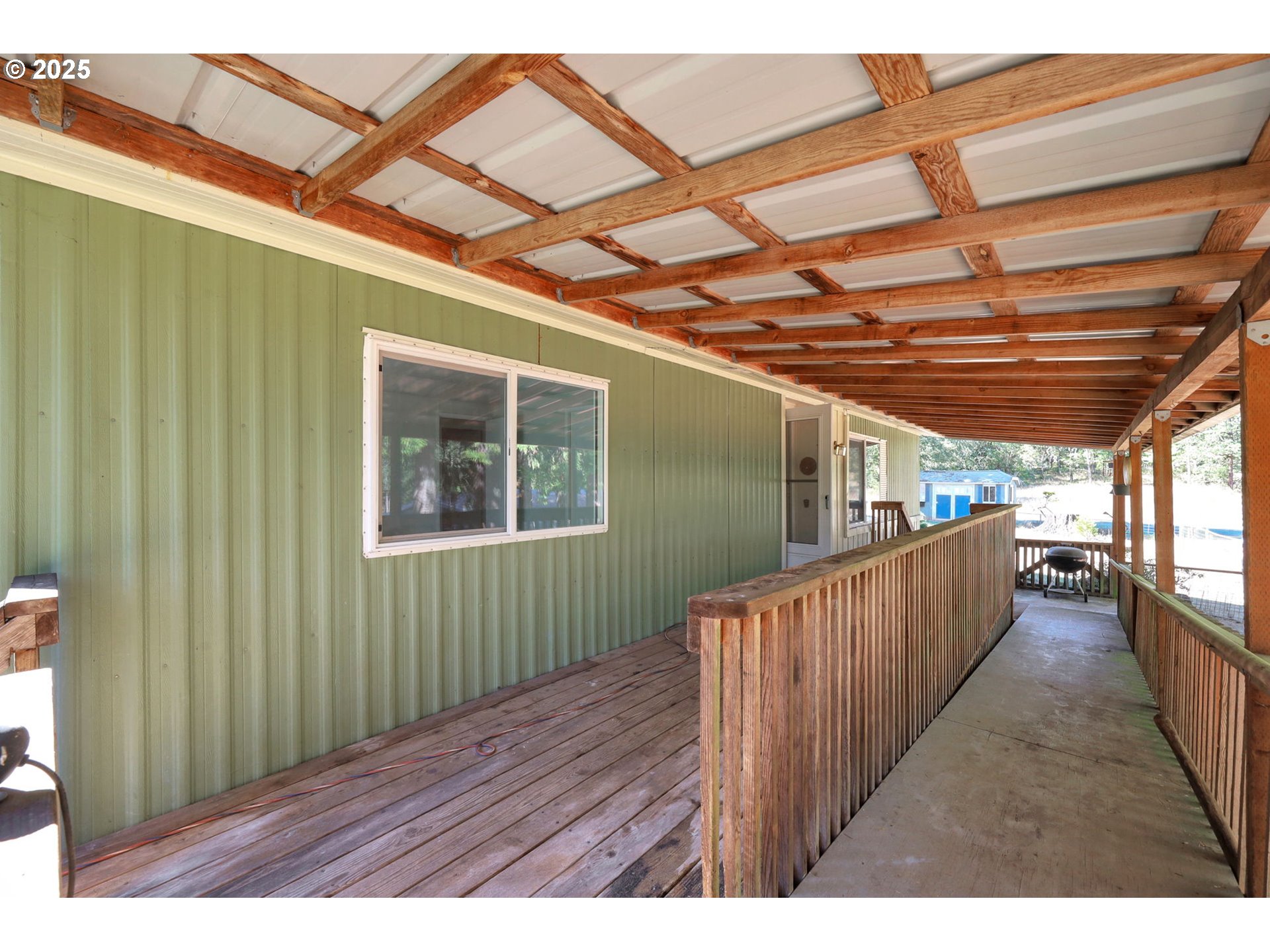 31145 Kenady Lane Cottage Grove, OR 97424 - Photo 6 of 47 a view of porch with wooden floor