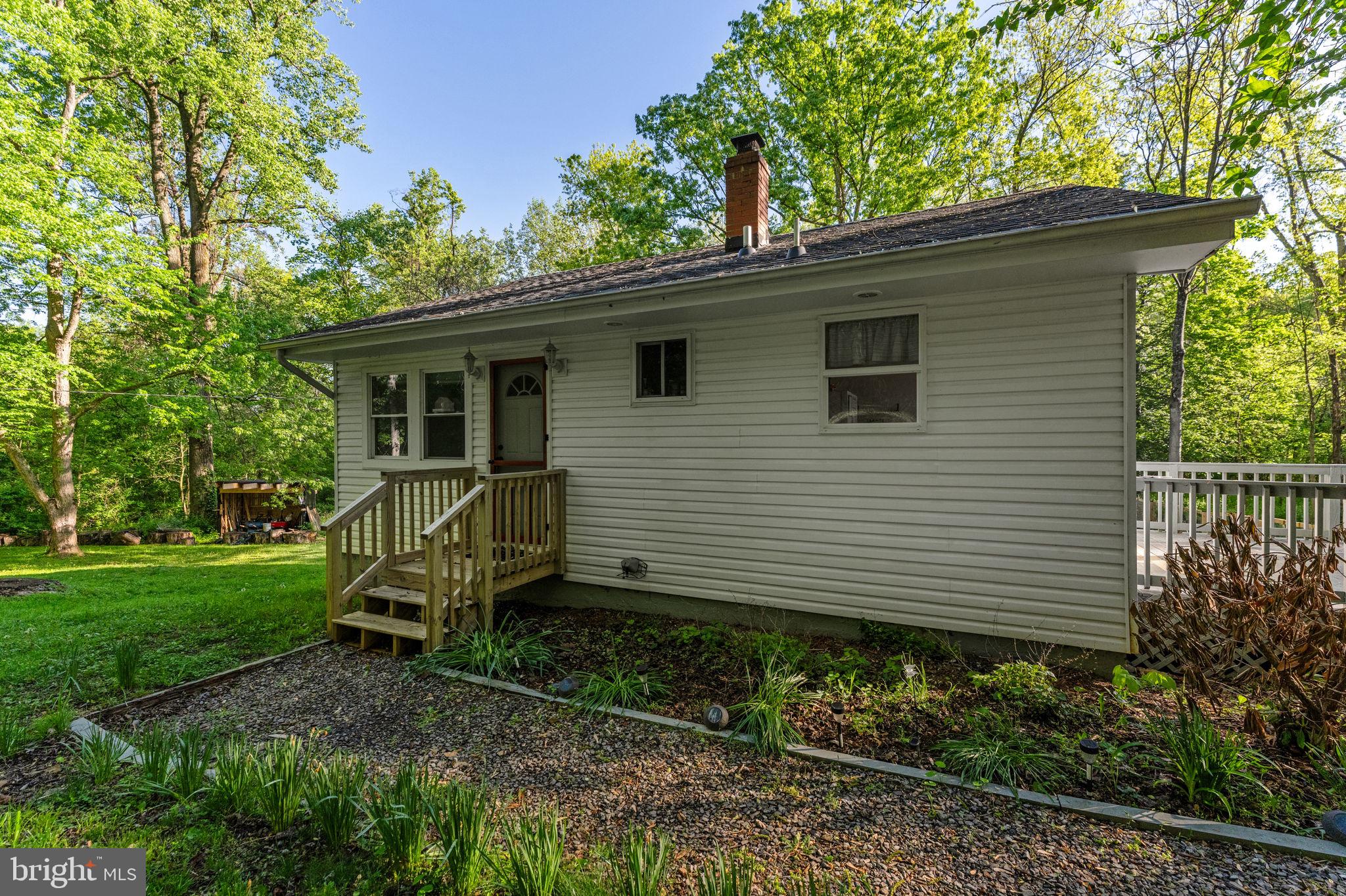 673 Creek Road Front Royal, VA 22630 - Photo 17 of 64 Charming home nestled in lush greenery.