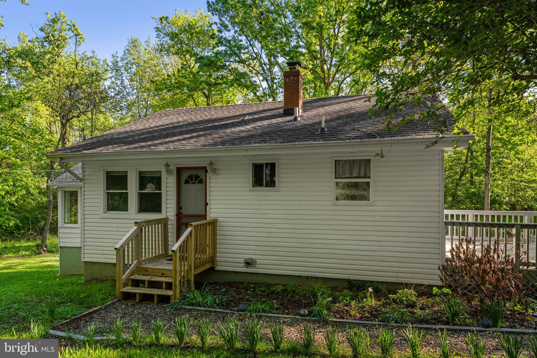 673 Creek Road Front Royal, VA 22630 - Photo 18 of 64 Charming home nestled in lush greenery.
